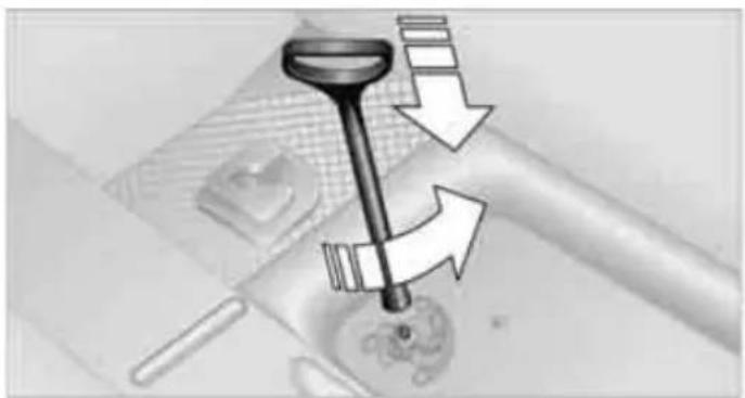 Diagram showing a mechanical tool interacting with a surface, with directional arrows indicating movement or force (no text or symbols present)