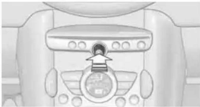 Top-down view of a vehicle's rear dashboard and steering wheel (no text or symbols visible)
