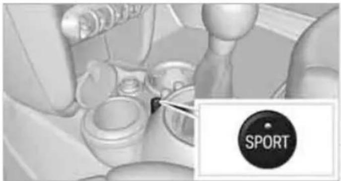 Interior view of a vehicle showing a car with a 'SPORT' button, no visible text or symbols on the main subject.