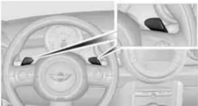 Interior view of a car dashboard with steering wheel and dashboard (no visible text or symbols)