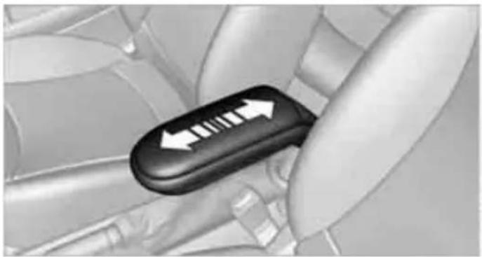 Close-up of a car seatbelt buckle with white directional arrows indicating left and right motion (no text or symbols)