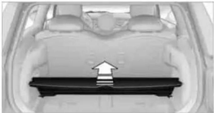 Interior view of a car showing the rearview seat with a black trapezoidal grille and an upward arrow indicating motion (no text or symbols)