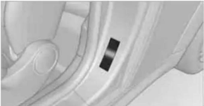 Close-up of a car interior showing the dashboard and steering wheel (no visible text or symbols)