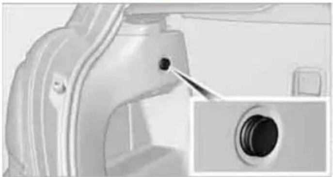 Close-up of a mechanical component with a close-up inset showing a circular detail (no text or symbols visible)