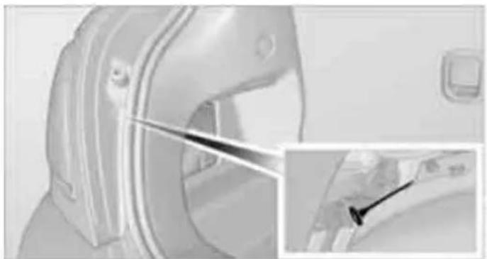 Close-up of a car interior showing the door and seat, with an inset close-up of the seat (no visible text or symbols)