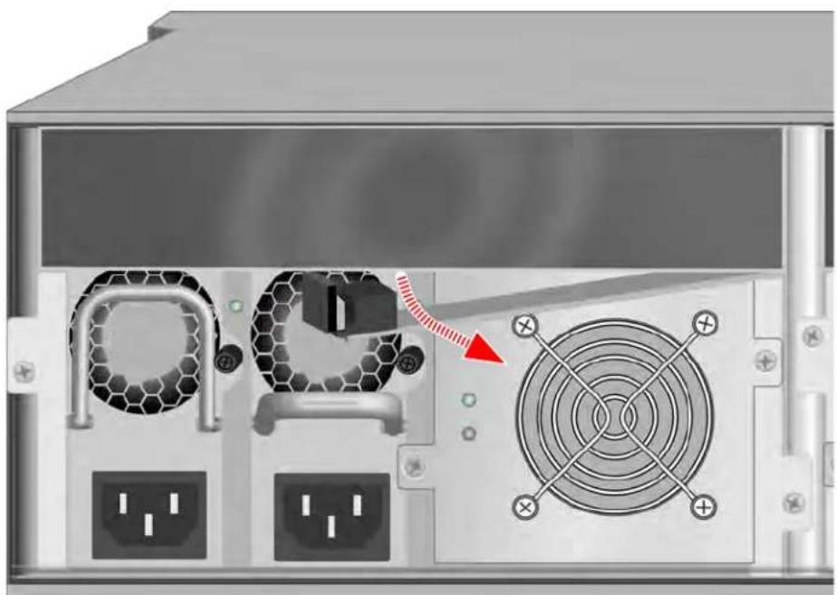 Internal view of a server rack with ventilation fans and power outlets, showing a red arrow pointing to a component (no text or symbols present)