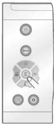 Control panel with labeled buttons and a cursor pointing to the center of the dial