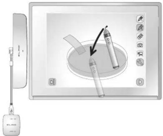 Diagram showing a device with a brush and pencil inside a screen, connected to a wall-mounted device with a scroll panel.