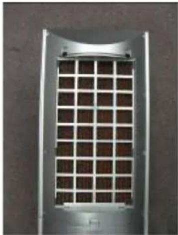 Close-up of a metallic ventilation grille with grid pattern (no text or symbols visible)