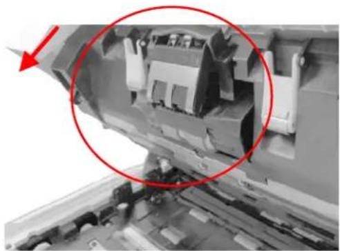 Close-up of a mechanical assembly with a red circle highlighting a component, no visible text or symbols