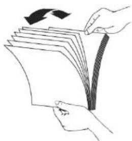 Illustration of hands holding a stack of documents with a curved arrow indicating rotation (no text or symbols)