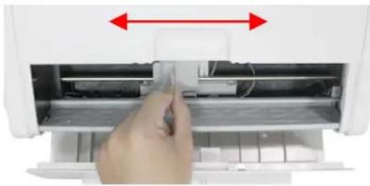 Hand inserting a plastic component into an air conditioner unit, showing internal structure and red double-headed arrows indicating direction (no text or symbols)