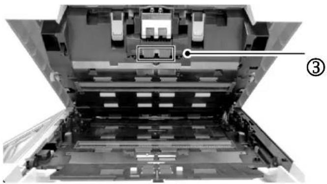 Interior view of a printer or printer with visible internal structure and labeled component (no text or symbols)