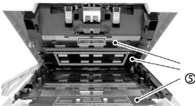 Top-down view of a printer internal structure showing internal components and labeled parts (no text or symbols present)