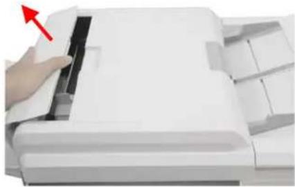Close-up of a hand pressing down on a white paper airplane (no visible text or symbols)