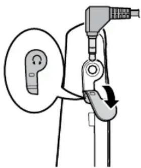 Diagram showing a mechanical device with a magnified inset view of a key inserted into a component.