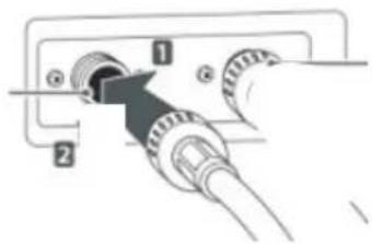 Diagram of a device with labeled parts, showing connections and numbered components