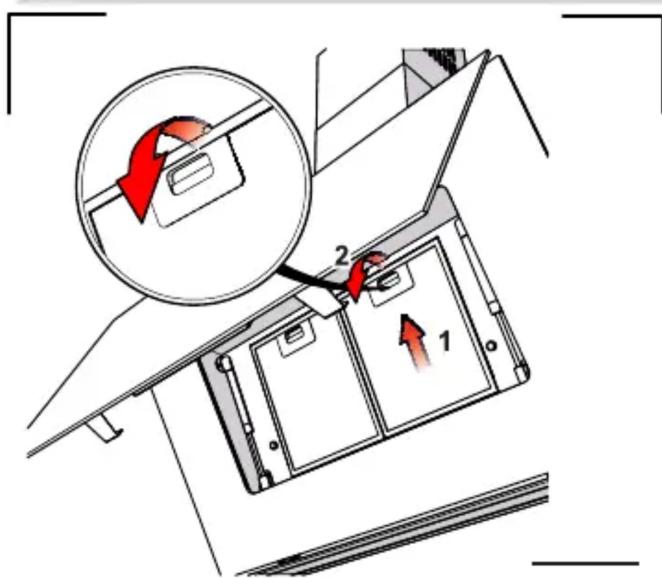 Diagram illustrating a device's internal structure with labeled parts and directional arrows indicating movement or flow.