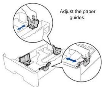 Adjust the paper guides.