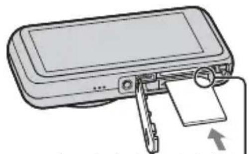 Line drawing of a device with a scroll and paper holder, no text or symbols present