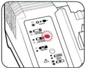 Diagram of a printer's front panel with warning labels and control buttons