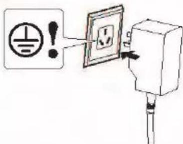 Diagram showing a warning symbol and electrical outlet with an electrical plug, indicating an electrical hazard or warning.