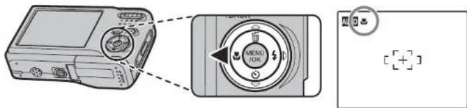 Diagram showing a digital camera with a left-side dial labeled 'MENU FOR' and an adjacent screen icon with plus signs.