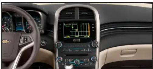 Interior view of a car dashboard with digital displays and steering wheel (no visible text or symbols)