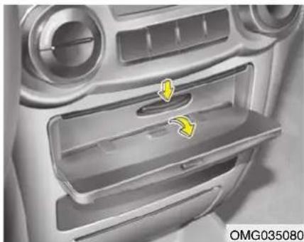 KIA Magentis II - Opbergvak middenconsole - 1