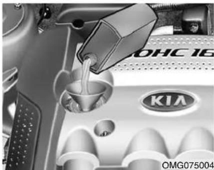 KIA Magentis II - Controle van het motoroliepeil - 1