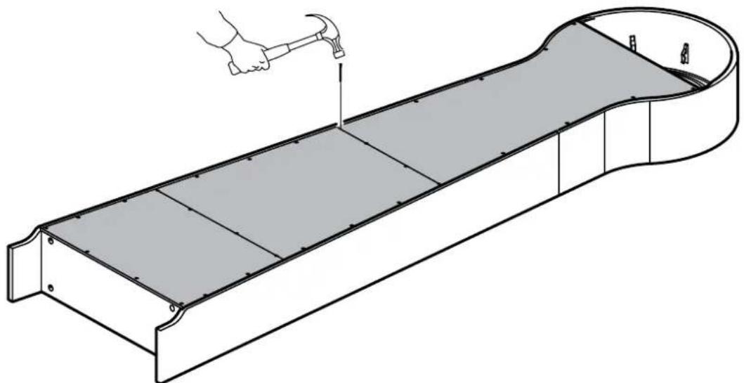 Technical line drawing of a mechanical component with a hand hammer for scale (no text or symbols)