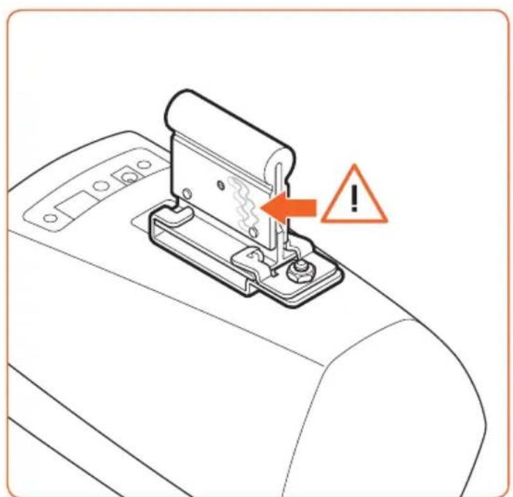 Diagram showing a sewing machine mechanism with warning symbol and warning arrow