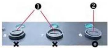 Diagram showing two labeled components (① and ②) with cross symbols on a surface, likely illustrating a mechanical or electrical setup.