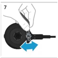 Hand holding a tool with a black screw and blue directional arrows indicating movement (no text or symbols)