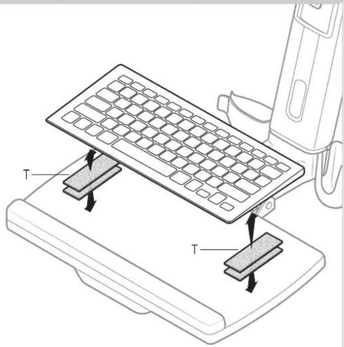 Technical diagram showing a keyboard being installed on a base with two labeled components (T) and a device in the background.