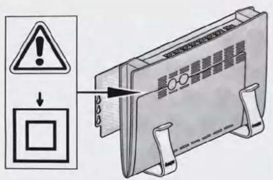 Diagram showing warning sign and warning box with magnified view of device