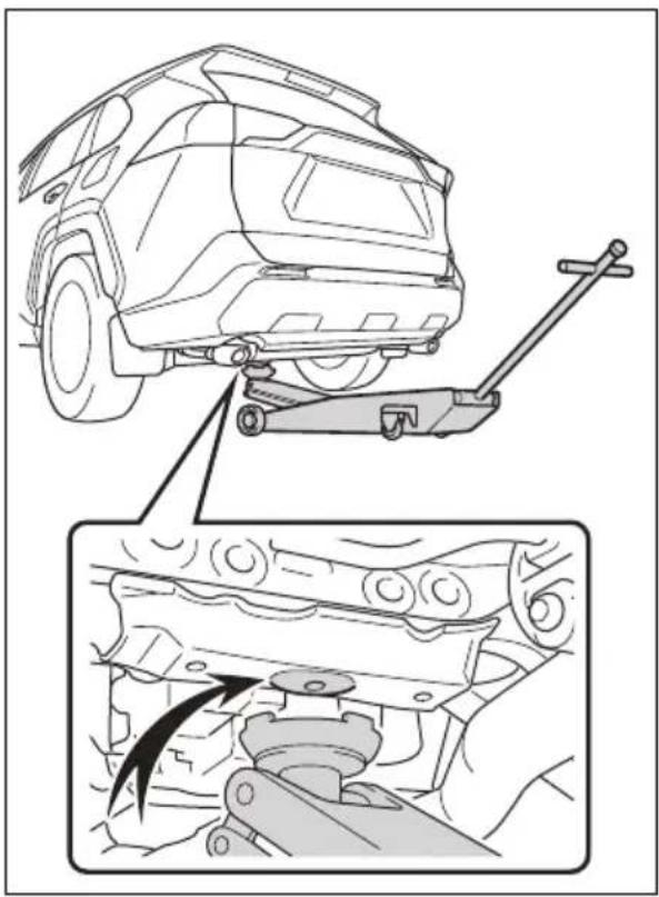Technical diagram showing vehicle suspension system with mechanical components and a close-up of the assembly process.