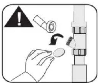 Diagram dat een hand toont die een klein object vasthoudt met waarschuwingssymbool en mechanische onderdelen, waarschijnlijk een veiligheids- of inspectieproces weergevend.