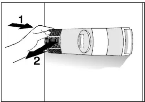 Diagram showing a hand holding a cylindrical object with labeled parts 1 and 2, likely illustrating a mechanical or optical setup.
