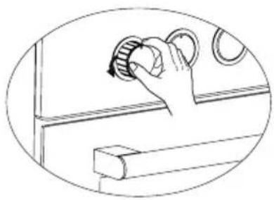 Line drawing of a hand holding a mechanical knob or dial, with no text or symbols present.