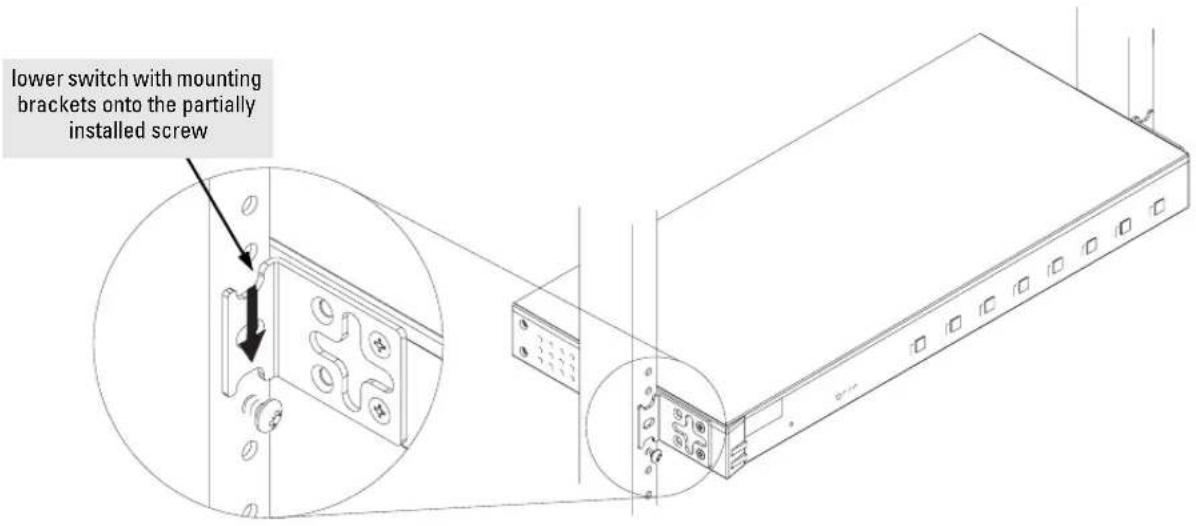 lower switch with mounting brackets onto the partially installed screw