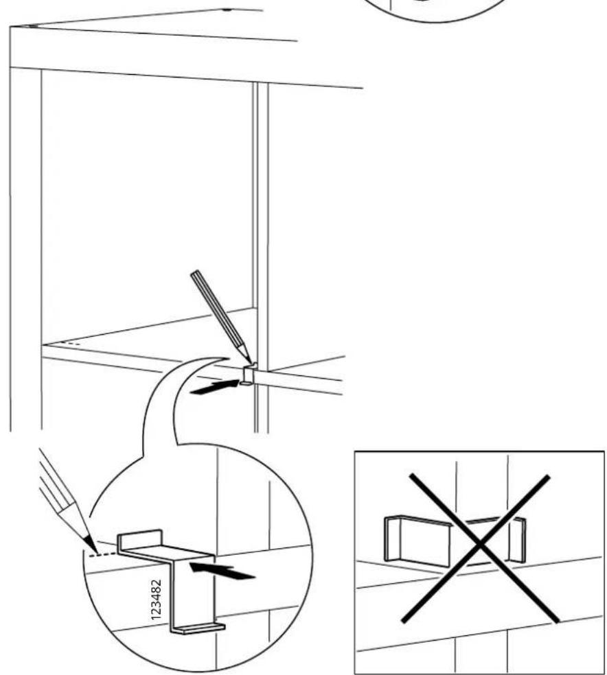 Technical diagram showing installation procedure with tool, magnified views, and no crossing symbol