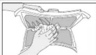 Illustration of hands holding a small object inside a container (no text or symbols visible)