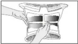 Illustration of hands placing a rectangular object into a container (no text or symbols visible)