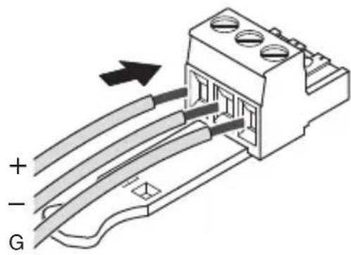 Diagram of a connector with labeled terminals (+, -, G) and an arrow indicating direction or connection point.