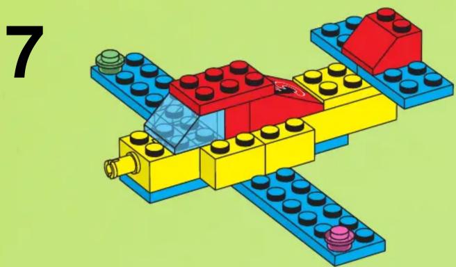 Illustration of a LEGO structure with blue, yellow, and red blocks (no text or symbols)