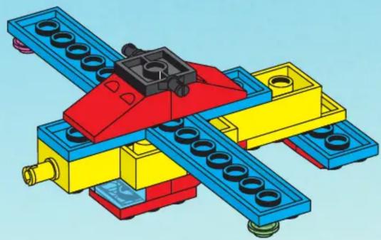 3D illustration of a LEGO mechanical assembly with blue, red, and yellow components (no text or symbols)