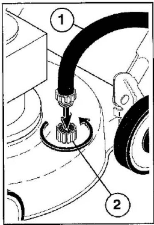Technical diagram showing mechanical assembly with labeled parts 1 and 2, including a pipe connection and rotational motion indicator.