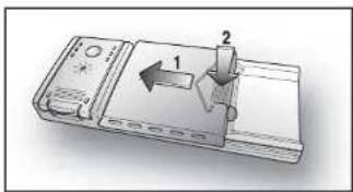 Diagram of a device with labeled parts and directional arrow indicating movement or force