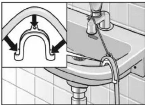 Diagram showing a pipe fitting on a sink with an inset illustrating the process (no text or symbols present)